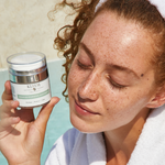 Girl holding her most loved Advanced Hydrating Moisturizer