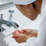 Applying Kleem Pro-Collagen Face Cleanser to skin, daily skincare ritual to cleanse, hydrate, leave skin soft and smooth