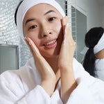 Applying Kleem Vitamin C Face Cleanser to skin, daily skincare ritual to cleanse, hydrate, leave skin soft and radiant